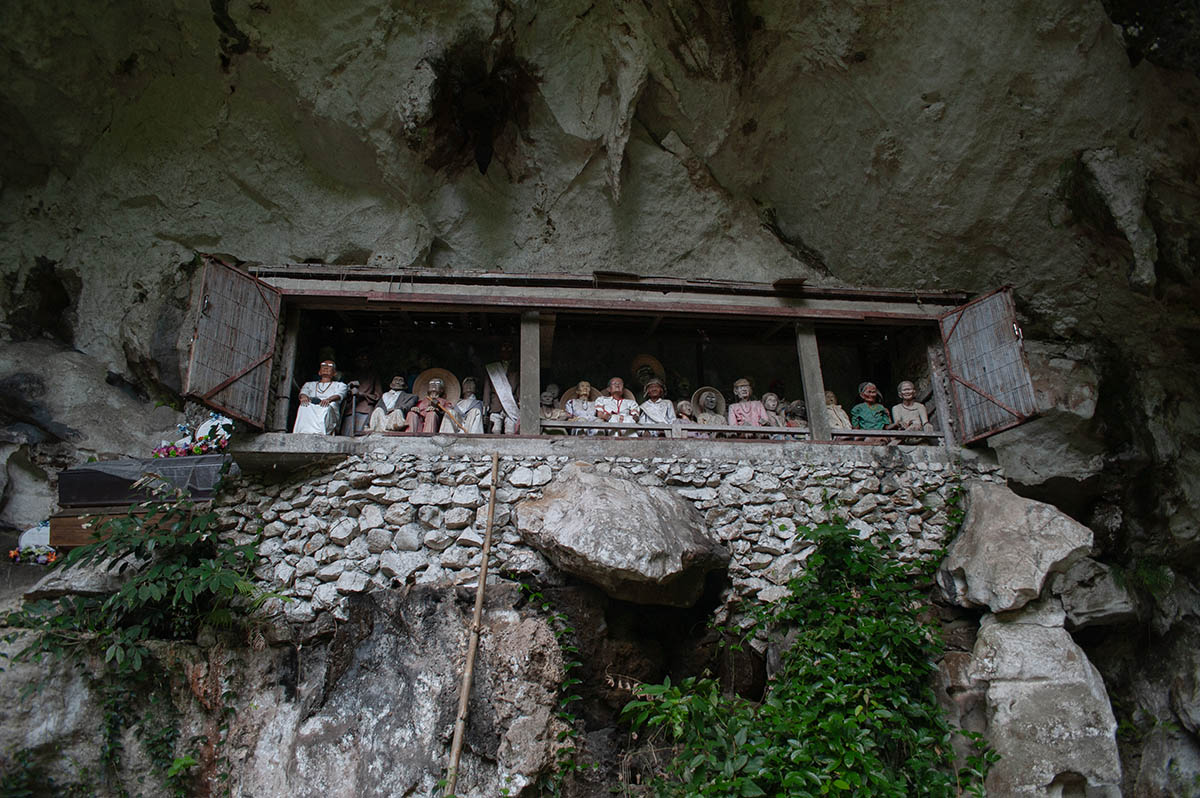 Tau tau (effigies) set high in the cliffs of Londa, near Rantepao, Sulawesi