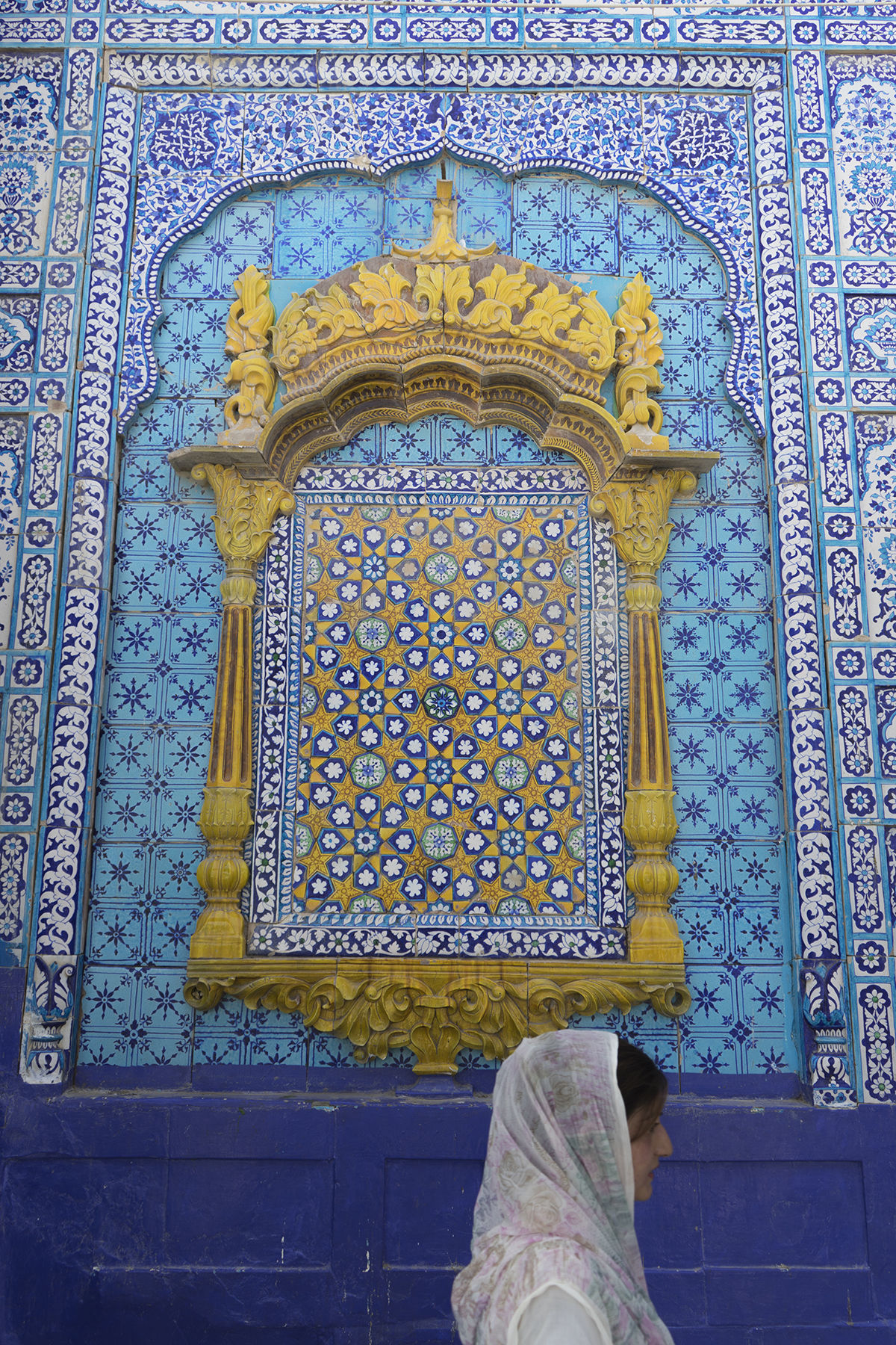 A woman at the Shrine of Sachal Sarmast